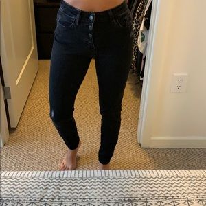 Black button front jeans